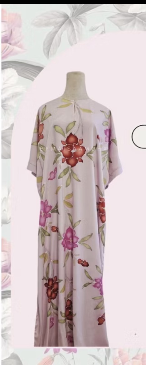 Soft pink kaftan with hand-drawn floral motifs