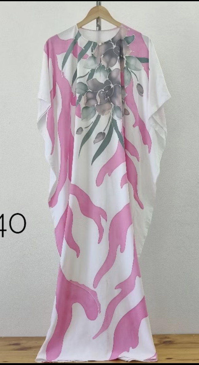 White kaftan with pink abstract batik pattern and floral motif